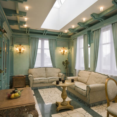 Vintage Conservatory Lighting being used to match the vintage décor of this conservatory