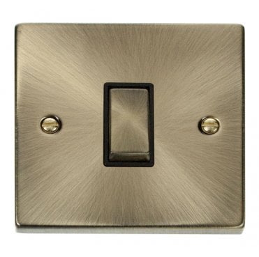 VPAB425BK Decorative 1G Ingot Intermediate Switch with Black Insert in Antique Brass