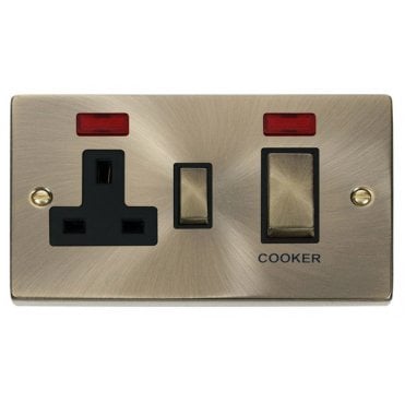 VPAB505BK Decorative 45A Ingot DP Cooker Switch with Neon and 13A Switched Socket with Black Insert in Antique Brass