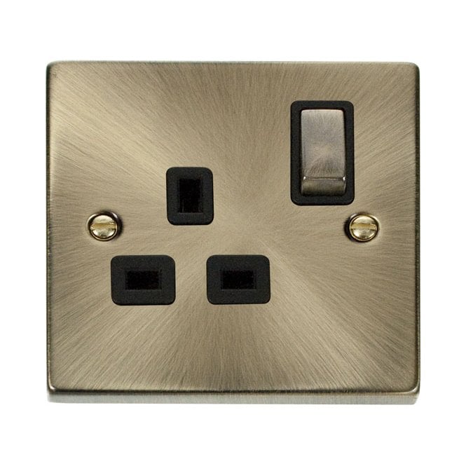 Click Switches and Sockets VPAB535BK Decorative Single Ingot Switched Socket with Black Insert in Antique Brass