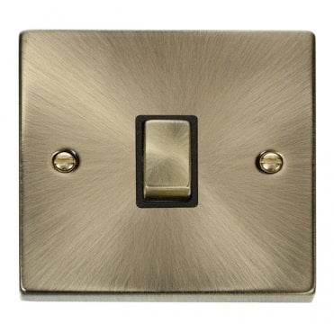 VPAB722BK Decorative 20A 1G Ingot DP Switch with Black Inserts in Antique Brass