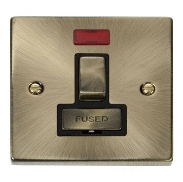 VPAB752BK Decorative 13a Ingot Switched Fused Spur with Neon with Black Insert in Antique Brass