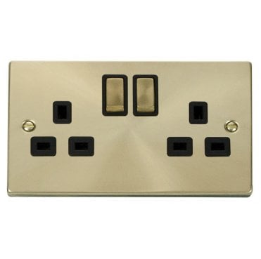 VPSB536BK Decorative Double Ingot Switched Socket with Black Insert in Satin Brass
