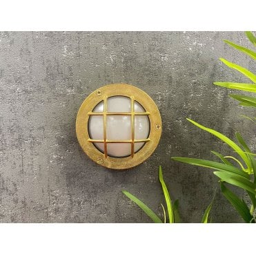 Navigator 09607 Outdoor IP64 1 Light Compact Mini Circular Bulkhead Light in a Raw Brass Finish