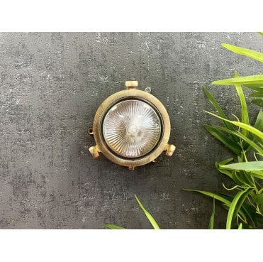 Navigator 09610 Outdoor IP44 1 Light Plain Mini Porthole Bulkhead Light in a Raw Brass Finish