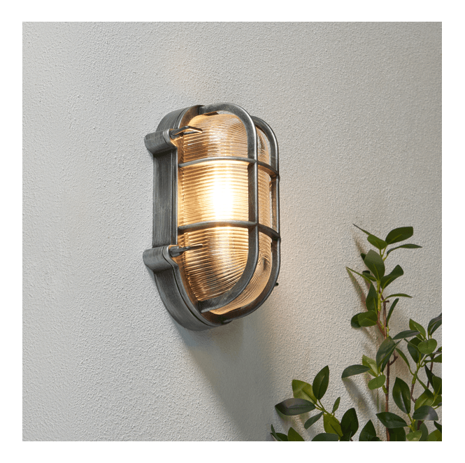 Zink ZN-44230-SIL Davey Outdoor IP44 9w Caged Oval Bulkhead in a Silver Finish